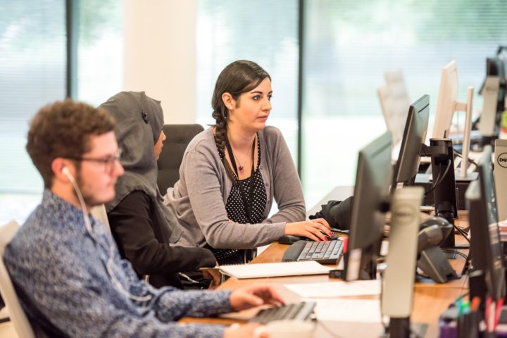 People collaborating on computers