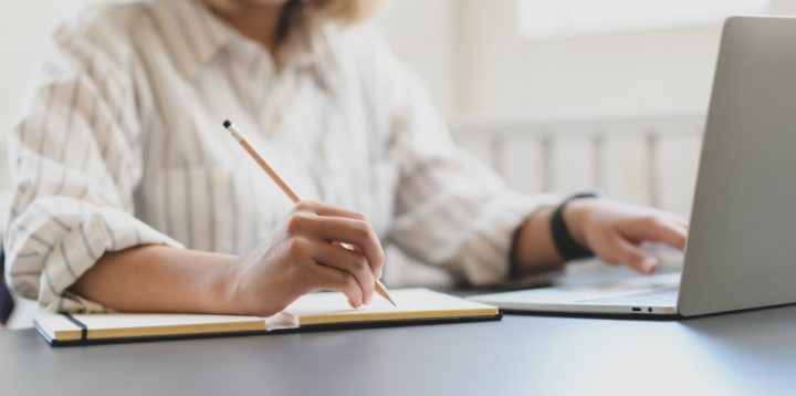 Writing in a book